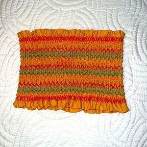 Yellow tube top with red, orange, blue, and green stitching!